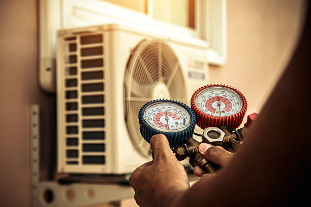 Professional Heat Pump Repair technician working in Kapaa, HI